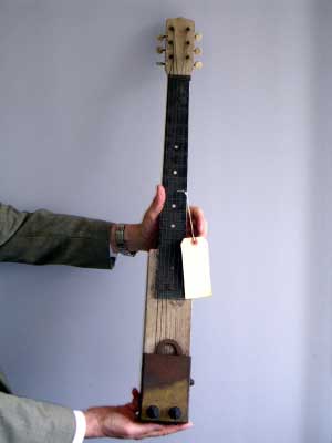image credit: <a href="http://www.physics.ncsu.edu/index.html" target="_blank">NC State Department of Physics</a>; <a href="http://www.physics.ncsu.edu/news/physics_firsts_guitar.html" target="_blank">image source</a>; <a href="http://www.compadre.org/informal/images/features/NCSU guitar large small.jpg" target="_blank">higher-res image/<a>